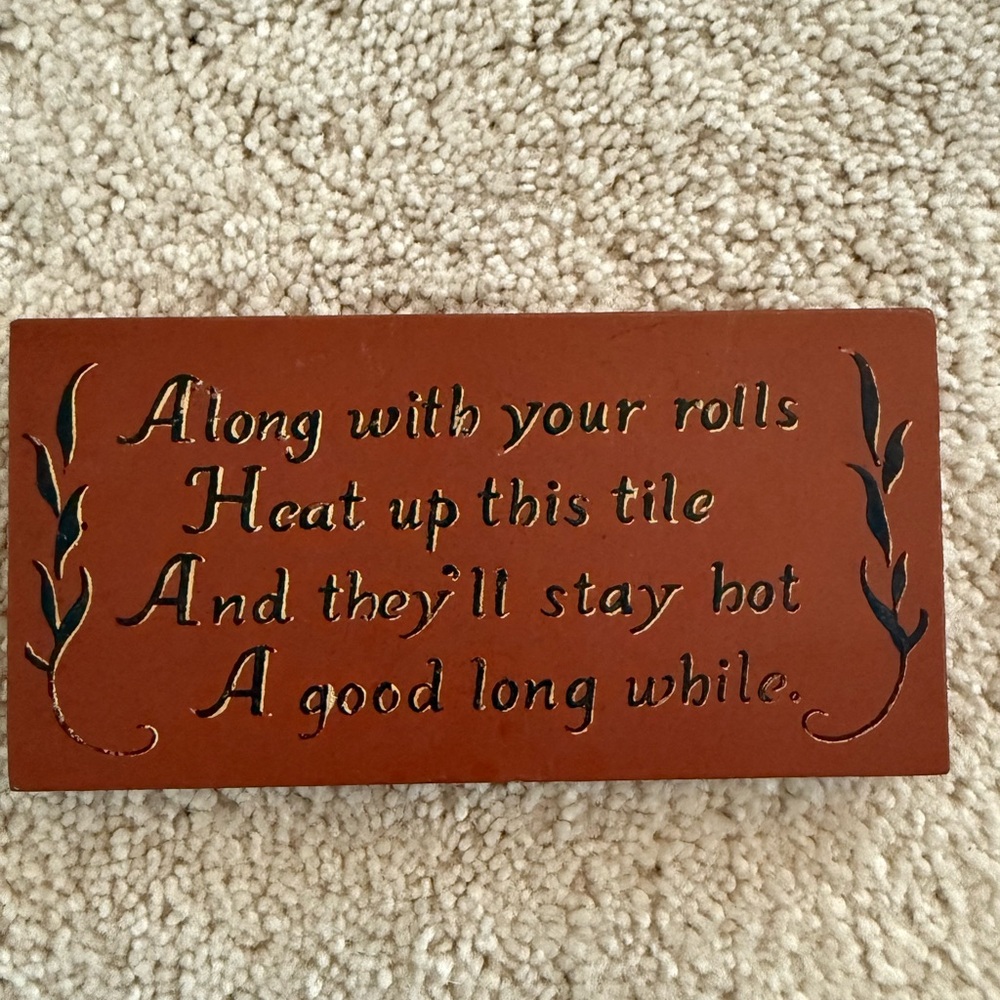 Decorative Brown Tile with Inscription